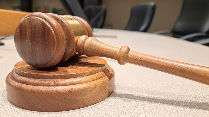 A gavel placed on the sound block at the council dais.